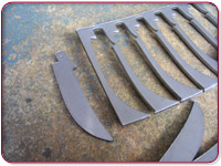 Blades and springs are first cut out of sheet steel
